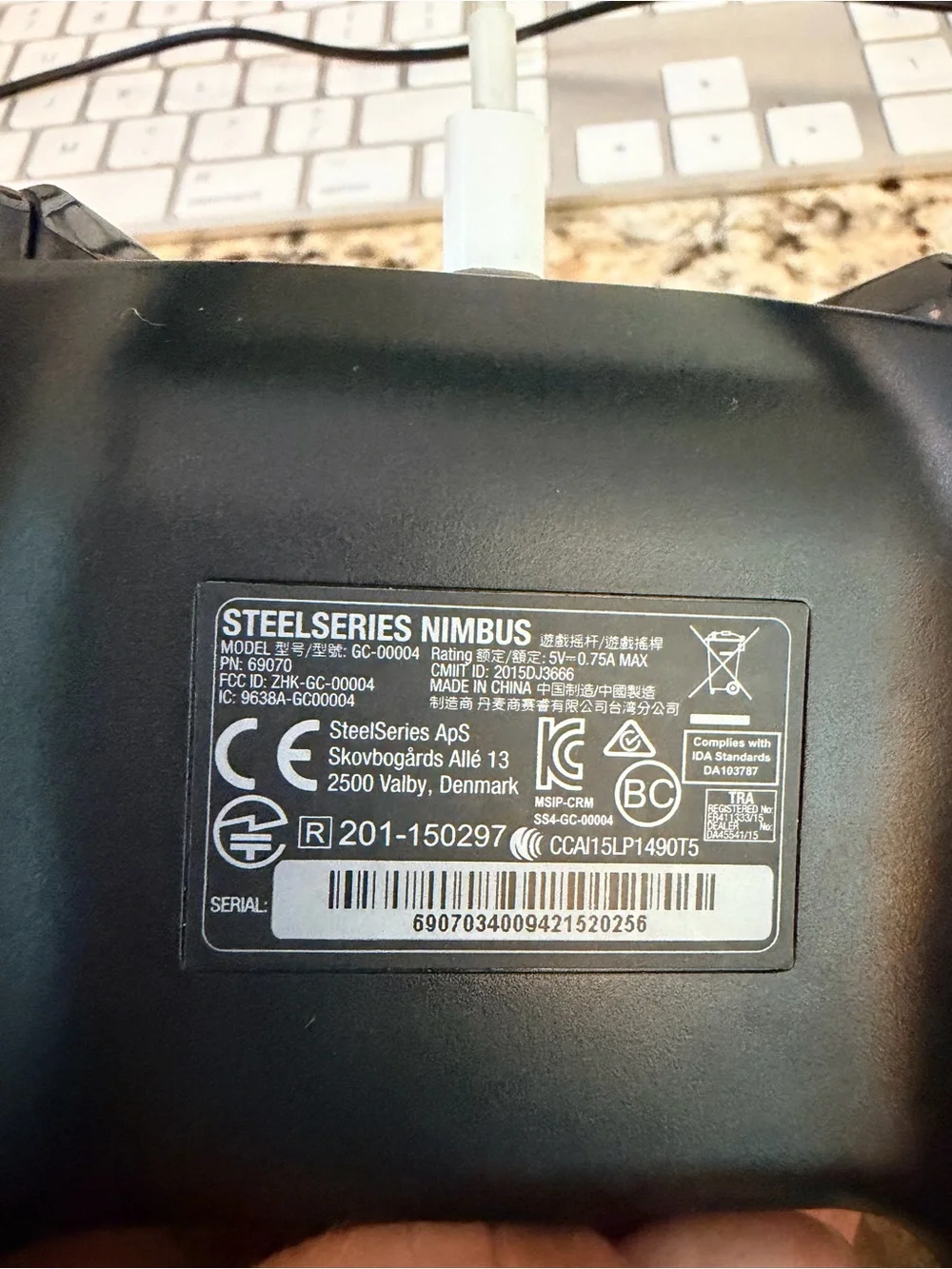 2 steel nimbus controllers and 1 Nintendo switch pro controller